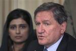 United States' special envoy to Afghanistan and Pakistan, Richard Holbrooke, right, speaks as Pakistani State Minister for Finance Affairs Hina Rabbani Khar looks on during a press conference in Islamabad, Pakistan on Wednesday, July 22, 2009.