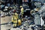 Search and Rescue crews work to save those trapped beneath the debris, following the Oklahoma City bombing, Oklahoma City, OK, April 26, 1995.