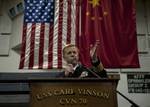 Capt. Kent D. Whalen, commanding officer of the Nimitz-class aircraft carrier USS Carl Vinson (CVN 70), delivers remarks during a reception for Hong Kong guests aboard the ship.