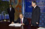 Nursultan Nazarbayev (centre, seating), President of the Republic of Kazakhstan, signs the multilateral treaty on Civil and Political Rights, at UN Headquarters in New York. ula1