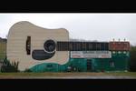 In 1983, owner Joe Morrell built this three story, 70 foot long Martin guitar. The Grand Guitar Museum within exhibits rare instruments shaped like a shovel, elephant, pig, and one made out of an armadillo. The Guitar faces I-81, directly across from TN Welcome Center.