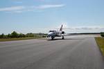 BOURNE, Mass. - After flying more than 15,371 hours in support of U.S. Coast Guard operations around the country, the Coast Guard HU-25 Falcon jet CG2133 lands at Air Station Cape Cod, Monday, June 6, 2011, after its final flight. The Falcons replacement, the HU-144 Ocean Sentry is due to arrive sometime next year and the CG2133, the first Falcon jet to be retired at the air station, will join the HU-16E Albatross CG7250 on display at the front gate of Air Station Cape Cod as a tribute to Coast