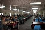 ANP cadets eating at the Kabul training center Student Dining Facility. It was reported in 2010 that the United States Army Corps of Engineers is building nearly 200 modern police stations for the Afghan National Police.