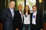 (Left to right) Peter Arnold (CFDA executive director), designer Michael Kors, model Carolyn Murphy and designer Tommy Hilfiger in New York City at the launch of 