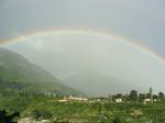 Fascinating with beautiful rainbows caught on camera in Himalayan town of India, and it looked like a miracle when it rains and sun is shining at the same time. , Dharamshala, District Kangra, India, 11th September 2011.