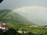 Fascinating with beautiful rainbows caught on camera in Himalayan town of India, and it looked like a miracle when it rains and sun is shining at the same time. , Dharamshala, India, 11th September 2011.