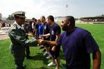 MOROCCO (June 21, 2005) Chief (OS) Brown, command chief aboard the Coast Guard Cutter Bear, shakes hands with a Moroccan Navy official before a soccer game between crewmembers of the cutter and a team from the Moroccan Navy June 21 in Agadir, Morocco. USCG photo by PA2 Andrew Shinn. (102246) ( CUTTER BEAR VISITS MOROCCO (FOR RELEASE) )