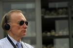 Australian Foreign Minister Bob Carr stands in front of the stupa loaded with thousands of human bone and sculls at Choeung Ek, a former Khmer Rouge 