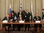 Russia's Energy Minister Victor Christenko, left, Greece's Development Minister Dimitris Sioufas, center, and Bulgaria's Regional Development Minister Victor Cherofski smile following a signing ceremony in front of Russia's President Vladimir Putin, left, Greece's Prime Minister Costas Karamanlis, center, and Bulgaria's Prime Minister Sergei Stanishev at the Presidential palace in Athens on Thursday, March 15, 2007. Russia, Greece and Bulgaria signed a deal to build a pipeline to transport Russian oil to a port in northern Greece. The 280-kilometer (175-mile) pipeline from Bulgaria's Black Sea port of Burgas will transport crude to the port of Alexandroupolis. The project will improve networks in southeastern Europe that transport oil and gas from the Caspian Sea region to the European Union.