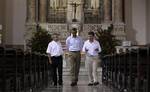 President Barack Obama, center, tours the San Pedro Claver church with the Roman Catholic Rev. Alvaro Gutierrez, left, and Colombia's President Juan Manuel Santos in Cartagena, Colombia, Sunday, April 15, 2012.