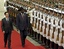 South Sudan's President Salva Kiir, right, reviews honor guard with Chinese President Hu Jintao, left, during a welcoming ceremony at the Great Hall of the People in Beijing, China, Tuesday, April 24, 2012.