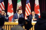 From left, Mexican Secretary of National Defense Gen. Guillermo Galvan Galvan, Canadian Minister of National Defense Peter MacKay and U.S. Secretary of Defense Leon E. Panetta answer questions from the media afer a trilateral meeting in Ottawa, Canada, Tuesday, March 27, 2012. (DoD Photo by Glenn Fawcett)(Released)