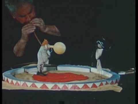 Alexander Calder performs his 