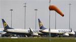 Planes stand grounded at Dublin Airport Tuesday, May, 4, 2010, as Iceland's volcanic ash renewed its threat to European air space, forcing Ireland to shut services temporarily for the first time in 12 days _ and reminding European leaders they still must improve their aviation coordination system.