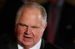 Conservative talk show host Rush Limbaugh talks with guests in the East Room of the White House in Washington, Tuesday, Jan. 13, 2009, prior to a Presidential Medal of Freedom ceremony for Colombian President Alvaro Uribe, former British Prime Minister Tony Blair and former Australian Prime Minister John Howard.(AP Photo/Ron Edmonds)