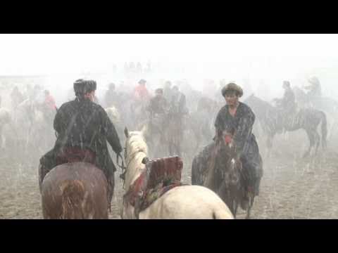 NATO in Afghanistan - Richard Dunwoody does Buzkashi, an Afghan traditional sport (w/subtitles)