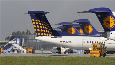 Aircrafts of the German airline Lufthansa Cityline are parked on the tarmac of at the Franz-Josef-Strauss airport in Munich, southern Germany, on Thursday, Aug. 7, 2008.