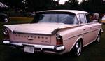 1961 Rambler Ambassador sedan. The 1961 Ambassador continued the previous year's 117-inch (2,972 mm) basic unitized platform, but received an unusual new front-end styling that was overseen by AMC's in-house design department headed by Edmund Anderson.