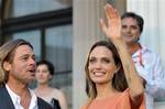 Angelina Jolie and Bred Pitt arrive on the red carpet during the final night of the 17th Sarajevo film festival in Sarajevo in Sarajevo, Bosnia, on Saturday, July 30,2011. Angelina Jolie and Brad Pitt have arrived in Bosnia's capital to take part in the closing ceremony of the eight-day Sarajevo Film Festival. Festival organizers said Saturday the actress will be receiving a special award during the surprise visit. Jolie visited Bosnia last year several times as UNHCR ambassador and drew attenti