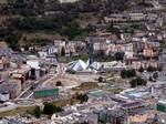 Andorra la Vella is the capital of the Co-principality of Andorra, and is located high in the east Pyrenees between France and Spain. It is also the name of the parish that surrounds the capital. The principal industry is tourism, although the country also earns foreign income from being a tax-haven. Furniture and brandies are local products.