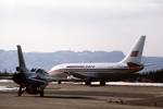 RNoAF F-16 and Braathens 737-200 at Flesland in 1981. All passengers traveling on international flight must pass through the duty free shop in order to get to their flight.