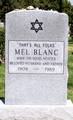 The epitaph on voice actor Mel Blanc's tombstone