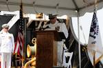 FORT MACON, N.C. - Lt. Cmdr. Mark Palmer gives his first orders at the end of the change of command ceremony after he took command of the Coast Guard Cutter Elm from Cmdr. John Kennedy here, July 22, 2011. The change of command ceremony is a time-honored tradition which formally restates to the ship's company that the continuity and authority of the command will be maintained. U.S. Coast Guard photo by Petty Officer 3rd Class David Weydert. (1324635) ( Elm Change of Command )