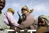 A Darfur rebel unit from the Sudan Liberation Army patrols the northern expanses of the region in Sudan Tuesday, Feb. 20, 2007, as delegates gather for a milestone unity conference at a secret location in Darfur.