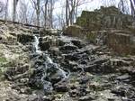 Water flows over a traprock surface in the Watchungs. The magma which generated the Watchungs and the Palisades also formed the intrusive igneous Sourland Mountain in Central New Jersey, as well as a series of smaller outlying volcanic ridges in the region.