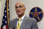 Homeland Security Secretary Michael Chertoff speaks during a news conference at U.S. Secret Service offices in San Jose, Calif., Tuesday, Aug. 5, 2008. The Department of Justice announced Tuesday that it had charged 11 people in connection with the hacking of nine major U.S. retailers and the theft and sale of more than 41 million credit and debit card numbers. It is believed to be the largest hacking and identity theft case ever prosecuted by the Department of Justice. The charges include consp