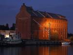 A former mill building of Vaasan Höyrymylly Oy in Toppila harbour, Oulu. Designed by architect Artturi Ortela (at the time Artturi Helenius) and built in 1924. Later several enlargements have been made on plans made by W. G. Palmqvist.