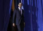 President Barack Obama walks out to deliver remarks at a conservation event at the US Dept. of Interior in Washington, Friday, March, 2, 2012.