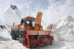 Snow cutter clear snow after the re-opened Zojila Pass, 108 kilometers (68 miles) north of Srinagar, on April 25, 2012.