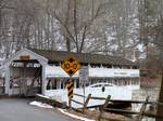 Side view of a covered bridge in Valley Forge National Historical Park, crossing Valley Run creek. See front view at Valley Forge Bridge. One lane, actively used, near Lord Sterling's Headquarters. In either Chester County or Montgomery County, PA.