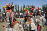 Ladakhi girls, wearing a traditional dress, present a cultural programme during the second day of Kashmir Festival in Srinagar on Sunday, 11, OCT 2009, The dress is typically worn by a community representing the last race of Aryans in the two villages of Ladakh