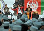 Afghan artist Aryan Khan performs for the members of the Afghan National Civil Order of Police at the ANCOP compound in Kabul, Afghanistan, June 12. The Welcome Home Ceremony and two hour concert honored the ANCOP who recently returned from the Helmand Province.