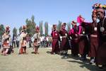 Ladakhi girls, wearing a traditional dress, present a cultural programme during the second day of Kashmir Festival in Srinagar on Sunday, 11, OCT 2009, The dress is typically worn by a community representing the last race of Aryans in the two villages of Ladakh