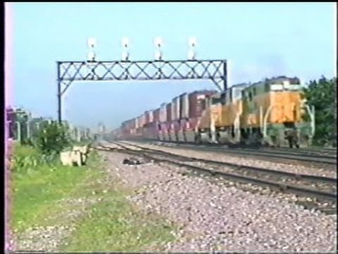 A C&NW GP7??? Leading a stack train?? HOLY COW!!! Nelson, IL. 6/15/1993