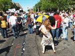 Avenue C street fair with dancing in the East Village of New York City. At the corner of Loisaida and 9th Street, there are two sizable (by Manhattan standards) community gardens that are maintained by the surrounding community.