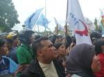 Batam,Indonesia on November 23,2011 - Demo workers in Batam ended chaos. The protesters entered the office of Mayor of Batam pages and destroy various facilities there,They march demanding a wage increase from Rp 1.3 million in 2011 to Rp 1.7 million in 2012