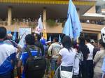 Batam,Indonesia on November 23,2011 - Demo workers in Batam ended chaos. The protesters entered the office of Mayor of Batam pages and destroy various facilities there,They march demanding a wage increase from Rp 1.3 million in 2011 to Rp 1.7 million in 2012