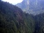 In this photo released by Indonesian Air Force, the wreckage of a missing Sukhoi Superjet-100 are scattered on the mountainside in Bogor, West Java, Indonesia, Thursday, May 10, 2012.