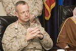 File - U.S. Marine Corps Maj. Gen. John Allen, deputy commanding general of Multi-National Forces-West (MNF-W), talks with Iraqi sheiks during a meeting at Camp Fallujah, Iraq, Jan. 19, 2008.