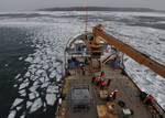 STRAITS OF MACKINAC - Crewmembers aboard the Coast Guard Cutter Hollyhock, homeported in Port Huron, Mich., transit through ice near Mackinac Island, Jan. 24, 2012. The crew of the Hollyhock is participating in a project led by the Coast Guard's Research and Development Center, showcasing techniques for removing spilled oil from a frozen environment. U.S. Coast Guard photo by Petty Officer 1st Class Matthew Schofield. (1505320) ( Oil in Ice Project )