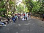 Filipinos walk on the road along Shrine Hills in Matina, Davao City, Philippines for the Via Crucis or Way of the Cross in time for the observance of Good Friday, when Catholics believe that Jesus Christ died on the cross to save the people from sin as seen in this April 9, 2009 file photo. .