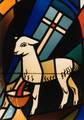 Lamb bleeding into the Holy Chalice, carrying the vexillum.