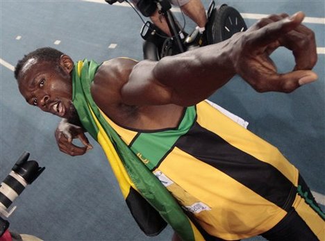 Jamaica's Usain Bolt celebrates after winning the gold medal in the Men's 200m final at the World Athletics Championships in Daegu, South Korea, Saturday, Sept. 3, 2011.