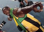 Jamaica's Usain Bolt celebrates after winning the gold medal in the Men's 200m final at the World Athletics Championships in Daegu, South Korea, Saturday, Sept. 3, 2011.