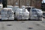 GULF OF MEXICO Bales of cocaine, seized by a Coast Guard law enforcement team, are shown ready for transport off of the USS Oak Hill, Dec. 9, 2011. Working jointly with the Oak Hills crew, the Coast Guard team, comprised of members from Pacific Tactical Law Enforcement Team, Tactical Law Enforcement Team South and Maritime Safety and Security Team San Diego (91109), interdicted more two tons of cocaine from the motor vessel Mr. Geo. U.S. Navy photo. (1486720) ( Coast Guard law enforcement team,