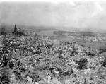 The Kölner Dom (Cologne Cathedral) stands seemingly undamaged (although having been directly hit several times and damaged severely) while entire area surrounding it is completely devastated. The Hauptbahnhof (Köln Central Station) and Hohenzollern Bridge lie damaged to the north and east of the cathedral. Germany, 24 April 1945.